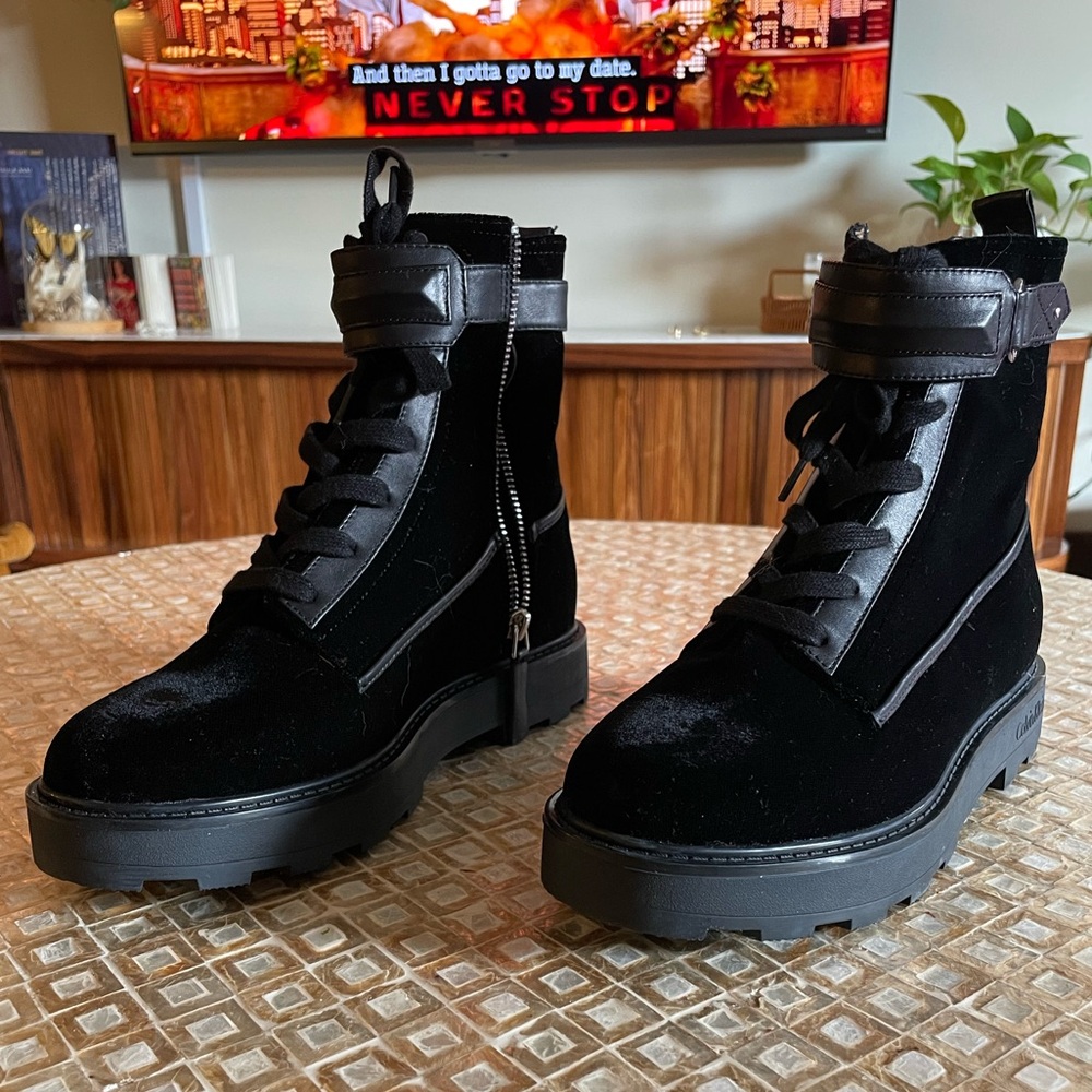 Black Calvin Klein 7M zipper boots